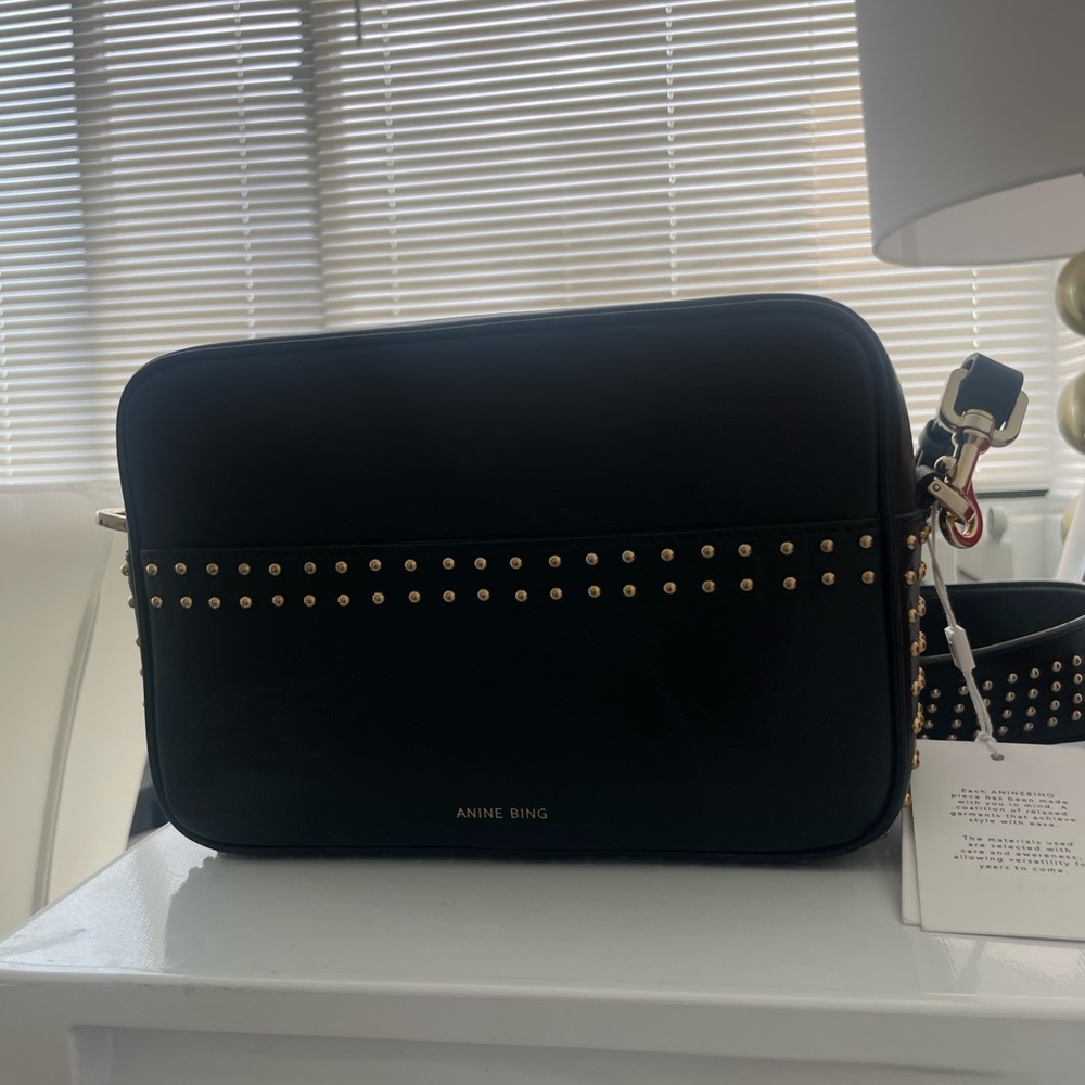 Brand: ANINE BING
Leather: CowhideGold-tone studded trimStructured silhouette
